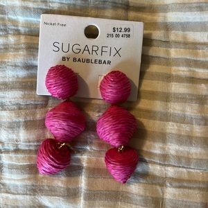 Fun pink earrings never worn or taken out of package